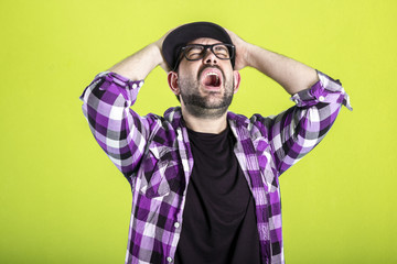 Face of an angry and furious male. The image is depicting emotions of anger and frustration