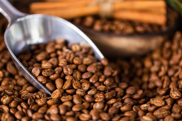 Coffee beans. On a wooden background rotation