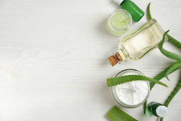 aloe vera and skin cream on white table