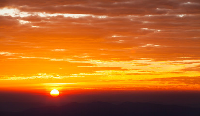 colorful dramatic sky with cloud at sunset..