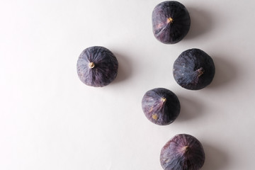 Ripe fresh fig isolated on white background