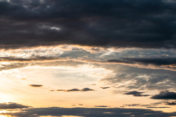 colorful dramatic sky with cloud at sunset..