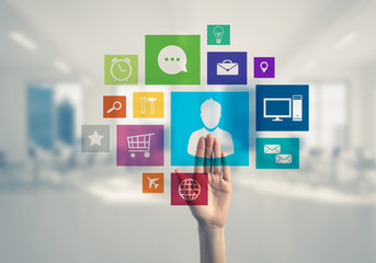 Modern office interior and close of businesswoman hand choosing 