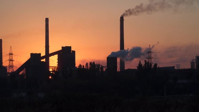 An industrial enterprise at dawn. Environmental pollution