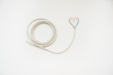 The white wire in the form of heart