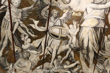 A detail of a fresco on a dome inside the Nuestra Señora de la Huerta gothic and mudejar cathedral, showing a knight fighting against devils together with angels, in Taragona, Aragon, Spain