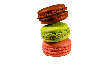 Tasty colorful macaroons isolated on white background