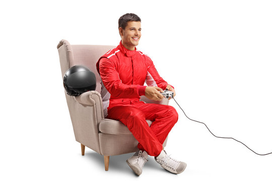 Racer sitting in an armchair and playing video games