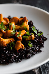 healthy seared girolles mushrooms with black rice