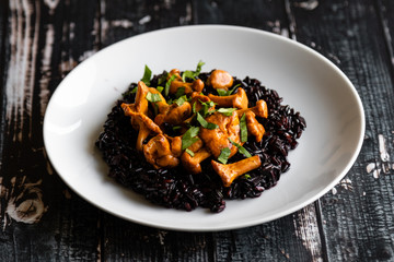 healthy seared girolles mushrooms with black rice