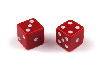 Two red dice closeup, isolated on white background, three and four