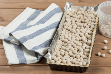 Cooking Process Of Homebaked Tart. Raw Dough In Baking Tray. Ceramic Baking Beans.