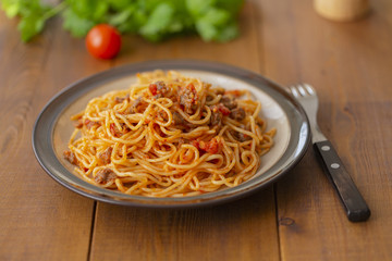 Spaghetti bolognese pasta with tomato sauce and minced meat. Homemade healthy italian pasta on wooden background