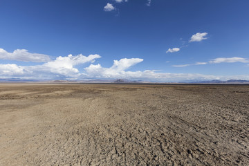 Fototapeta na wymiar Soda Dry Lake in the middle of the Mojave Desert near Baker California. 