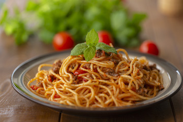 Spaghetti bolognese pasta with tomato sauce and minced meat. Homemade healthy italian pasta on wooden background