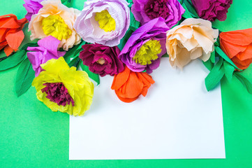 tools making crepe paper flowers green background