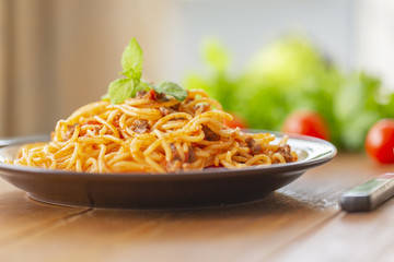 Spaghetti bolognese pasta with tomato sauce and minced meat. Homemade healthy italian pasta on wooden background