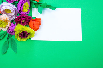 tools making crepe paper flowers green background