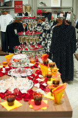 buffet table with snacks, cakes, drinks and champagne