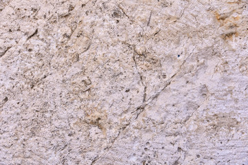 structure of a stone from an old masonry in a wall of a building of a historical part of a city Jerusalem