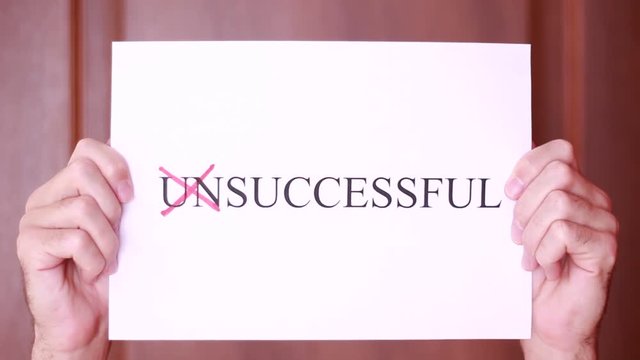 Prefix "Un" crossed out in "Unsuccessful" inscription