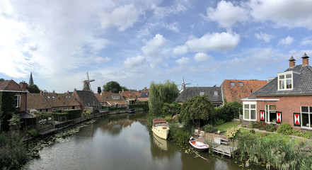 Fototapeta na wymiar Panorama from the canal in Winsum