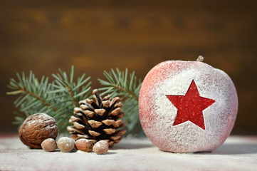 Christmas apple, nuts and pine cone