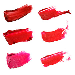 Collage of decorative cosmetics  color brush lipstick strokes on white background. Beauty and makeup concept.Beauty industry.