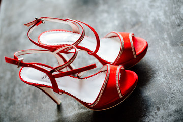 elegant red bride's wedding shoes
