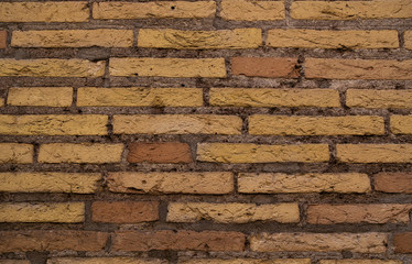 Old red brick wall background. Close shot.