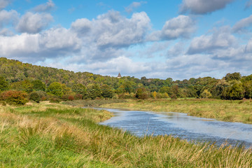 Fototapeta premium Along the River Ouse near Lewes in Sussex, on a sunny autumn day