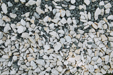 top view of white small scattered stones on ground