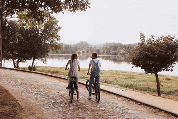 Romantic couple riding bicycles