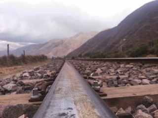  train tracks, sky with white clouds and black background, location in the vicinity of the city of...