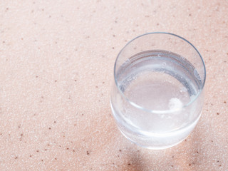 glass of water with effervescent tablet