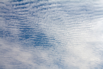 Obraz premium Blue sky with tiny clouds background..