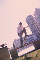 Follow my example. Attentive young man looking downwards while spending time on fresh air