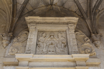A sculpture over an arch in the internal cloister in the Holy Mary Church (Iglesia de Santa Maria) in Uncastillo, a small rural town in the Pre-Pyrenees in the Aragon region, in Spain