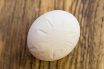 hen's egg with marks on the shell