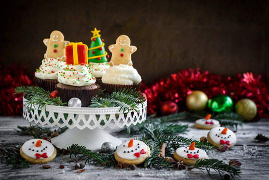 Christmas decoration on the cup cakes with blank space,selective focus
