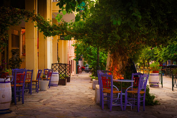 Mediteranean Coffee tables under a tree in Tisseo district of Athens in Greece