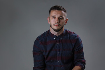 Portrait of a sad young man