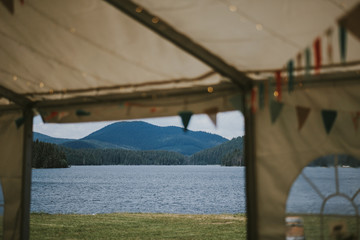 Mountain lake view from a tent