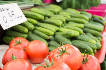Fresh vegetables on stands of market in autumn