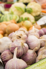 Fresh vegetables on stands of market in autumn