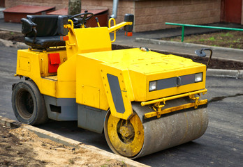Yellow roller for asphalt.