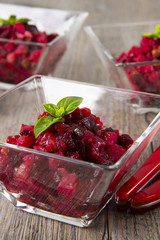 Salad from the beet. Vinegret is a traditional Russian salad made from beets and vegetables. Three bowls with salad.