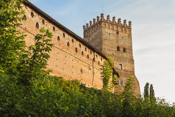 The medieval castle is illuminated by the sunset. Lutsk High Castle, also known as Lubart's Castle