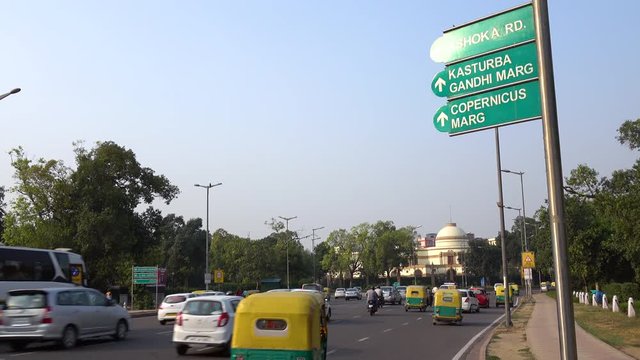 Traffic on city road around India Gate, New Delhi, India