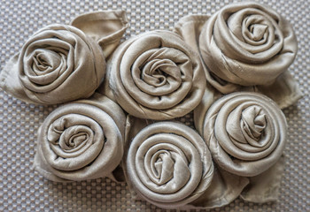 Golden napkin roses in a circle decoration table events holidays and party white isolated background